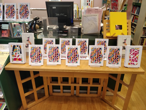 Another wide table showing Verve pamphlets laid out in a way that emphasises the strikingly visual design.