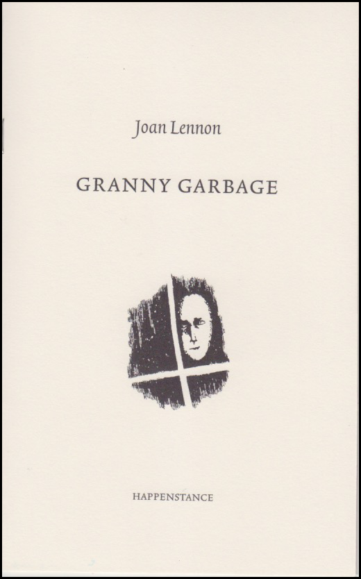 Ivory cover with black lettering and a spooky image of a face in a shadowy window